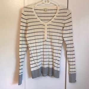 White and grey striped sweater